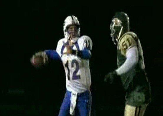 Matthew Bassuener in a white and blue number 12 uniform while working as the stunt double for JD McCoy in Friday Night Lights