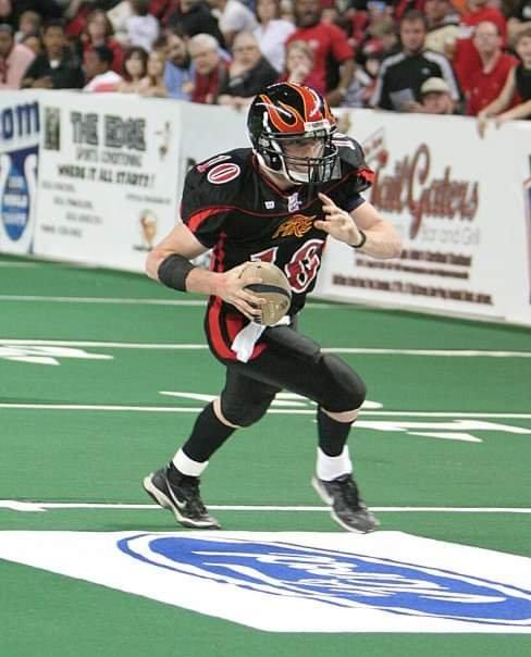 Matthew Bassuener in a black and red Louisville Fire uniform during his rookie year